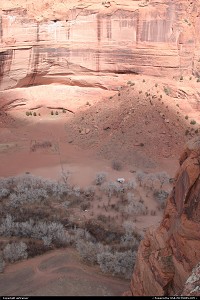 Canyon de Chelly. Impressive view of the heart of the canyon from the south rim. Yes, the little white dot in the middle is a house !