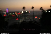 USA Pictures crew at work (or fun?) in Palissade Park, in front of the Pier at Santa Monica Beach. Nice sunset in the blurry background.