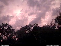 Iowa, Sun behind eerie storm clouds