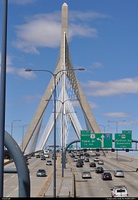Boston : http://en.wikipedia.org/wiki/Leonard_P._Zakim_Bunker_Hill_Memorial_Bridge The Leonard P. Zakim Bunker Hill Memorial Bridge (or Zakim Bridge) is a cable-stayed bridge across the Charles River in Boston, Massachusetts. It is a replacement for the Charlestown High Bridge, an older truss bridge constructed in the 1950s, and is the world's widest cable-stayed bridge. Of 10 lanes, the main portion of the Zakim Bridge carries four lanes each way (northbound and southbound) of the Interstate 93 and U.S. Route 1 concurrency between the Thomas P. 