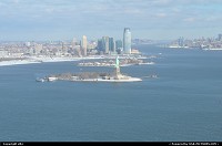 New York : Statue of liberty from helicopter flight. Was with NY Helicopter, and it was a bad flight. 226 $, supposed to be 20 mins, actually close to 15 minutes. The attendant on ground said that i can open the window, while flying the pilot was not in the same mind as he fellow. We were 6 so quickly there was mist on the windows, no u turn around statue of liberty, so better to be seat on the right side ... I flew an another company, and was better, so bad review for NY helicopter. Anyway here some pictures from sky !! 