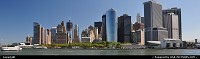 Nice pano of lower Manhattan from the Staten Island ferry. There is something unreal in these buildings ... One World Trade Center magnificient tower, afar, as it takes shape (as of 07/2011)