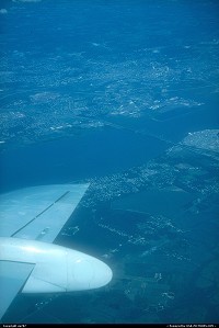 Not in a city : Somewhere between Baltimore and New York/La Guardia, the US Air Fokker 100 initiates the descent by banking on her staboard wing
