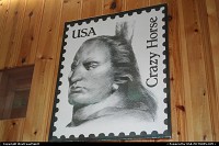 Not in a city : A portrait of Crazy Horse, proudly facing his territory on this stamp.