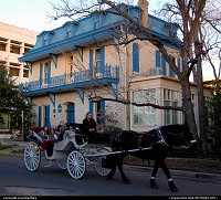 Horse-drawn carriage in Austin's historic Bremond Block