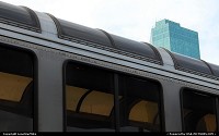 Fort Worth's Omni Convention Center Hotel rises above Amtrak's Texas Eagle as it sits in the station