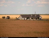 Not in a City : Farmhouse in Central Texas. Photographed from Amtrak's Texas Eagle.
