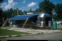 Wisconsin, More than a large recreational trailer than a mobile home. This immaculate steel covered vintage Airstream stands guard at an intersection. I never knew whether the proud owner was moonlighting as a street side instant restaurant, but I am still impressed by the green oversized gas cylinder !