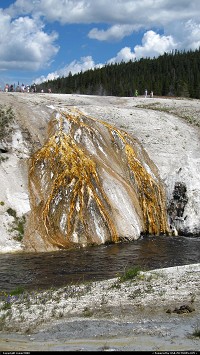 Wyoming, Old Faithful's waters flow into Firehole River.